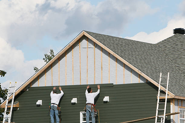 Professional Siding Replacement technician working in Wellington, CO